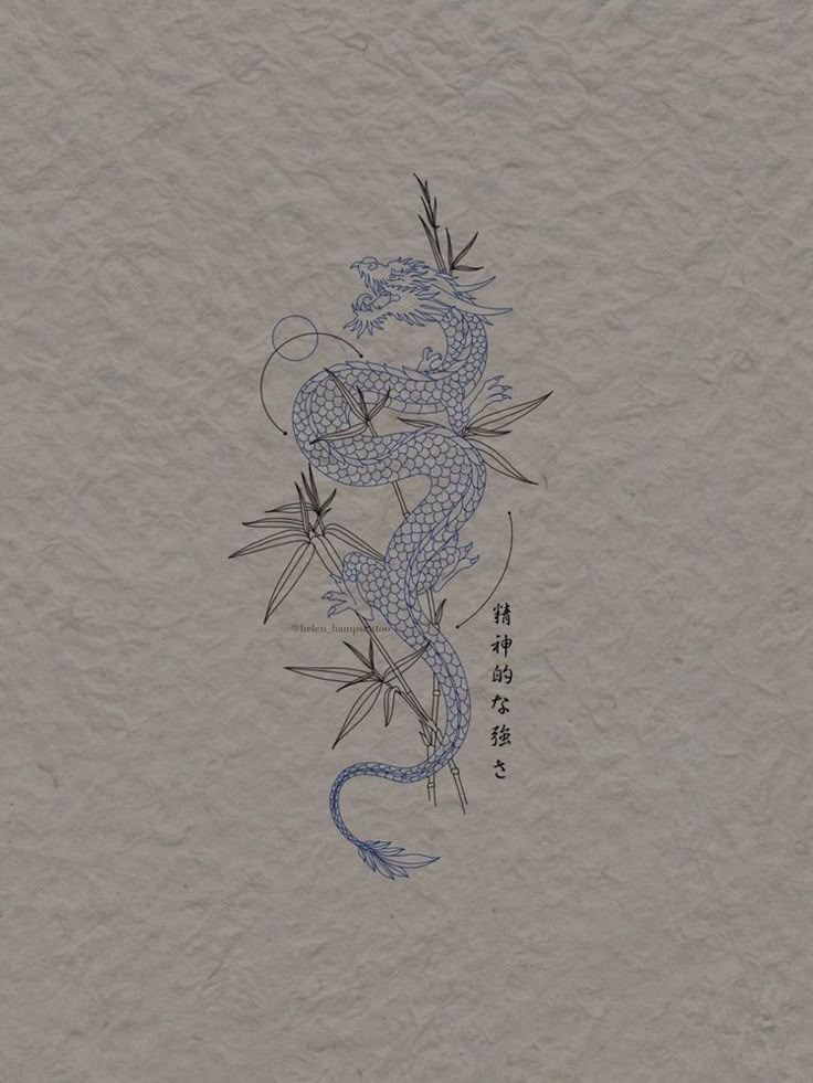 a drawing of a dragon on paper with chinese writing