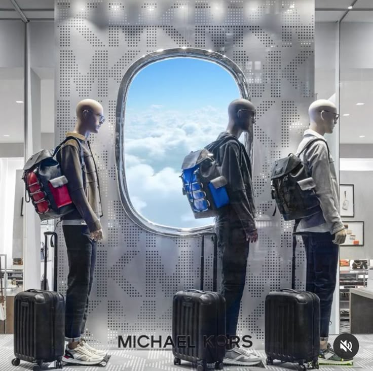 three mannequins are standing in front of an airplane window with their luggage