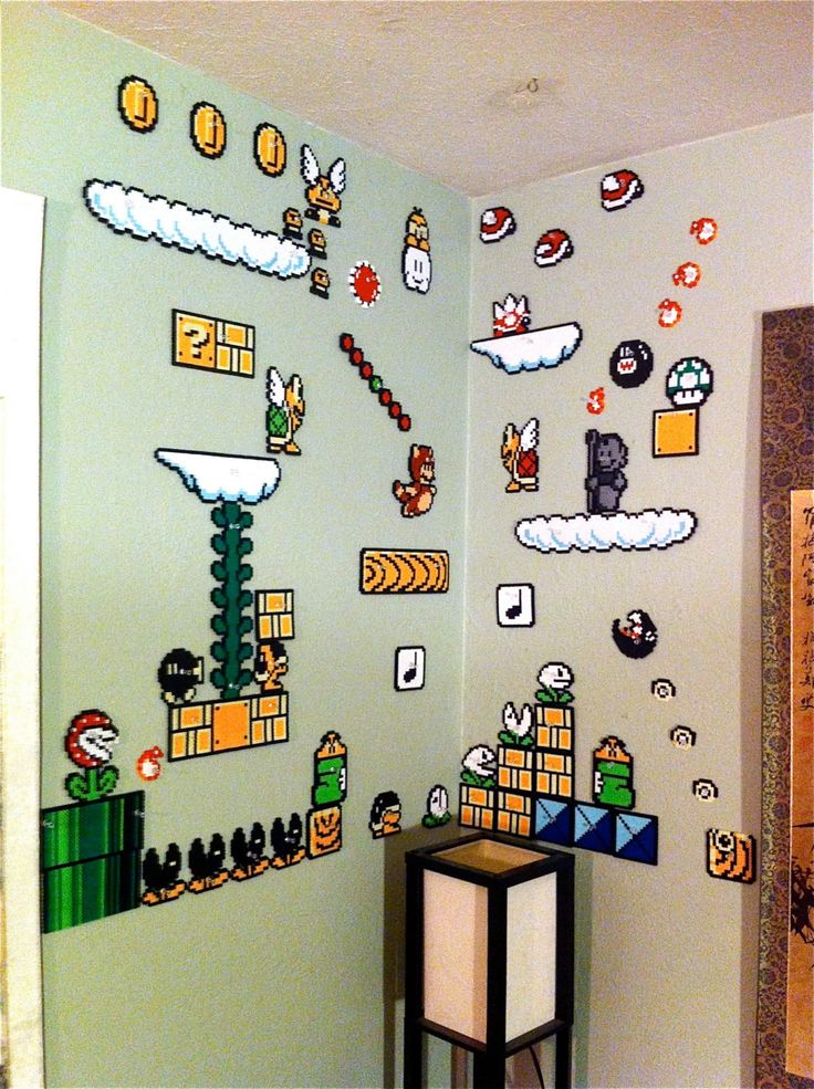 a nintendo themed room with mario and luigi's world wall decals on the walls