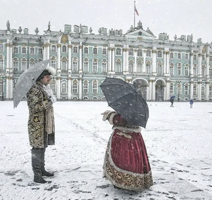 two people standing in front of a large building with snow on the ground and one holding an umbrella