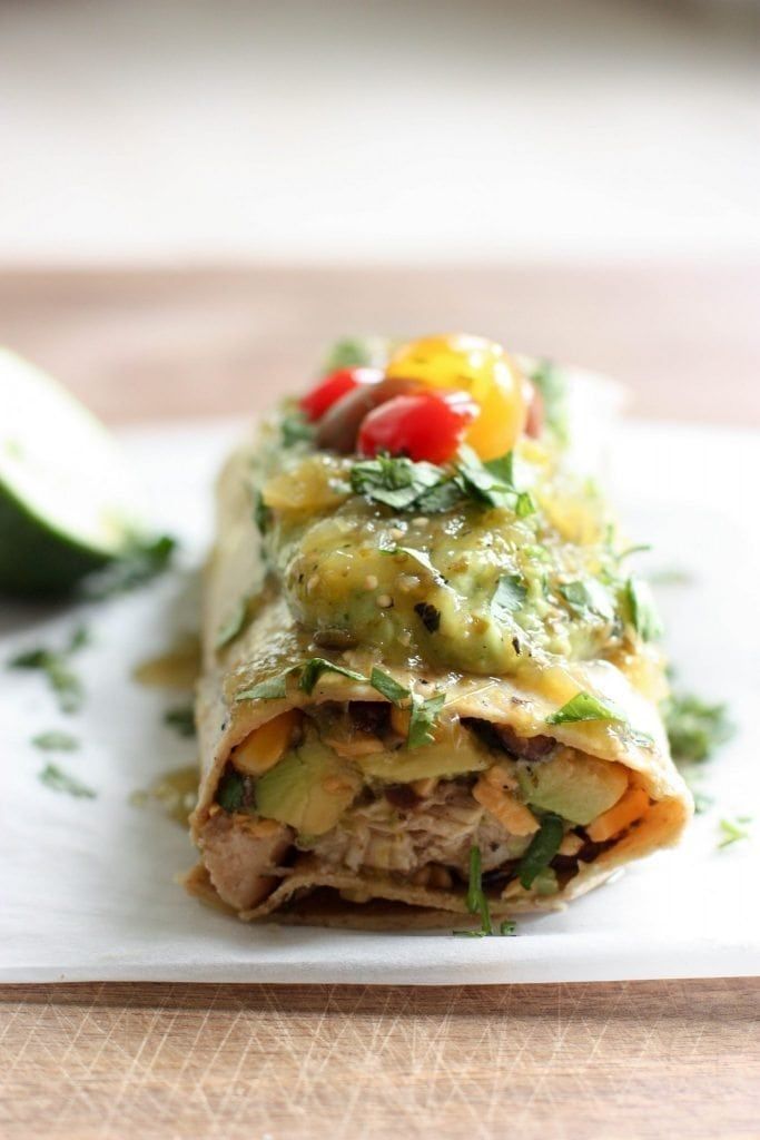 a vegetable enchilada is sitting on a plate