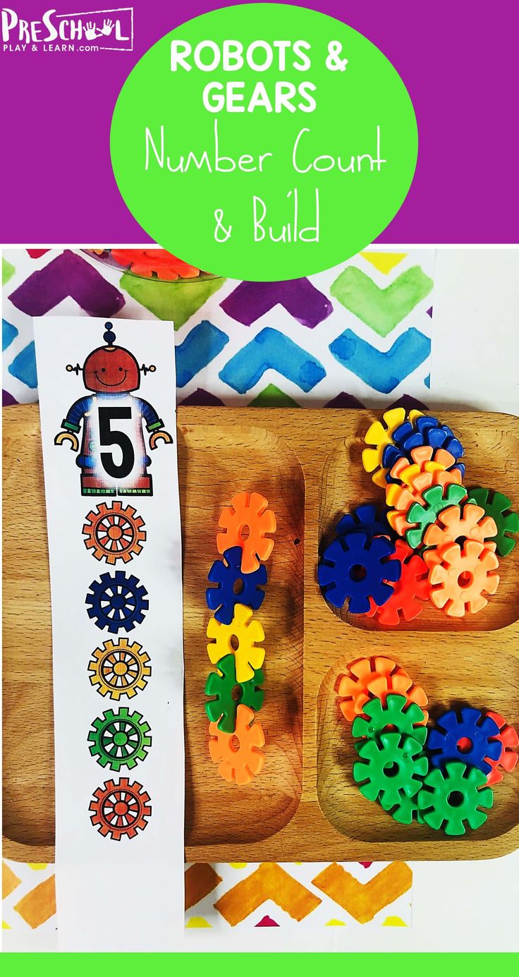 a wooden tray filled with lots of colorful gears and numbers next to a sign that says robots & gears number count and build