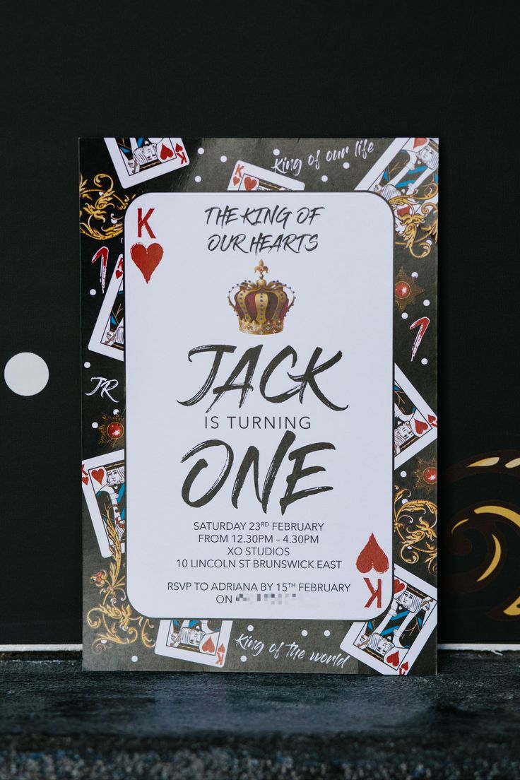 the king of our hearts jack is turning one birthday card with playing cards on it