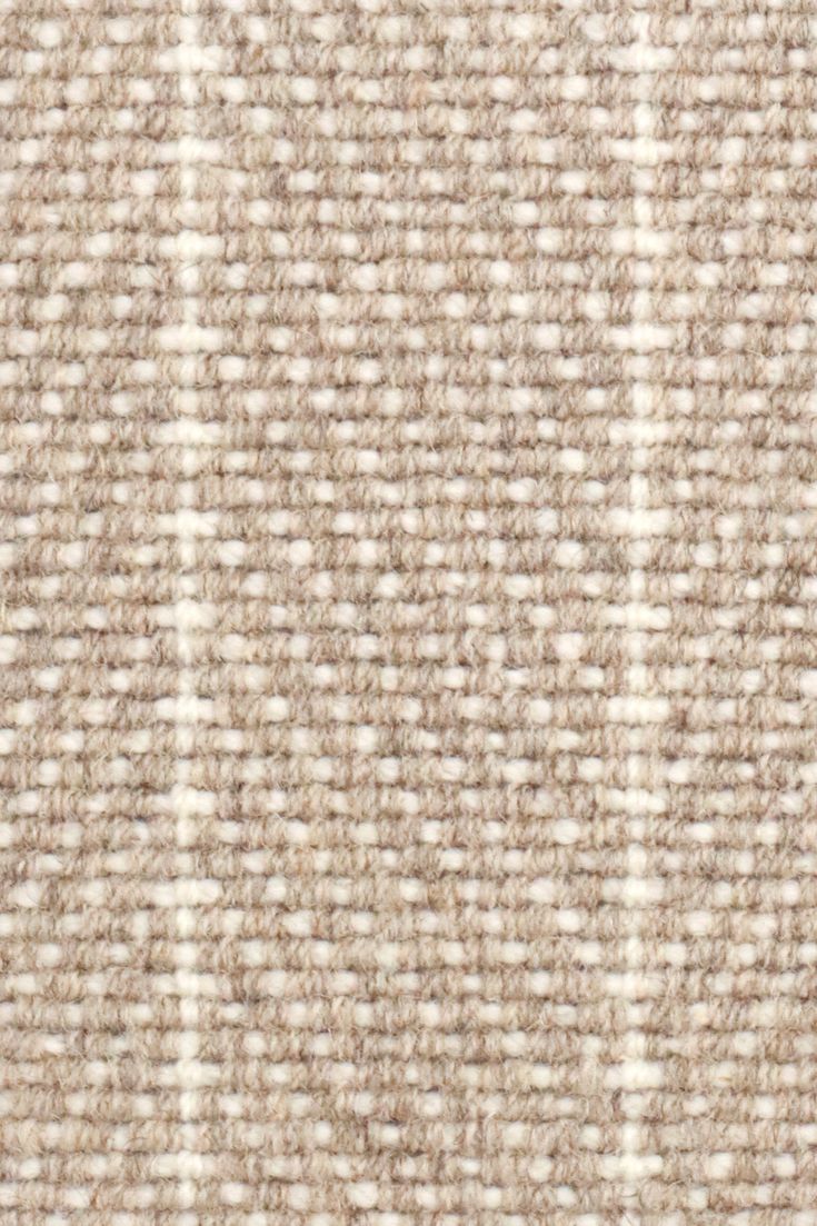 closeup view of beige and white checkered wool fabric textured with fine lines