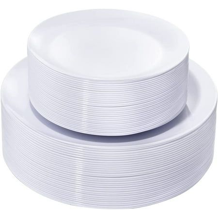 two white plates stacked on top of each other in front of a white background,