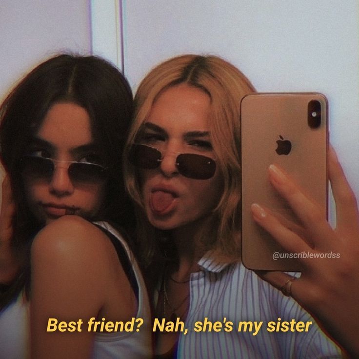 two young women taking a selfie with an iphone in front of them and the caption best friend? nah, she's my sister