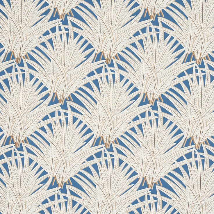 a blue and white wallpaper with palm leaves