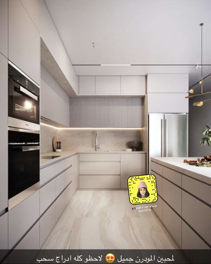 a modern kitchen with white cabinets and wood flooring, along with an oven on the wall