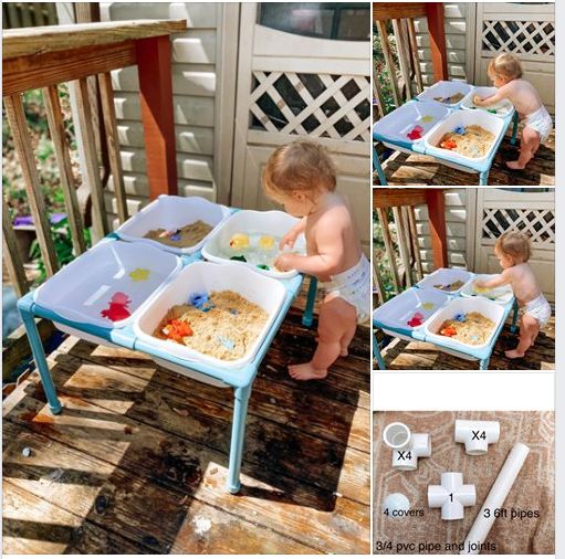 a toddler sitting on a table with food in it and playing with the trays