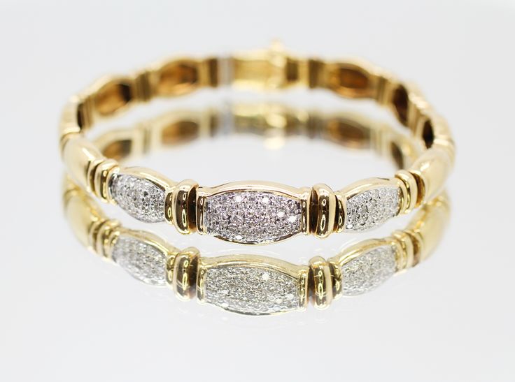 This vintage style diamond bracelet is absolutely stunning. The brilliant round diamonds are approximately 1.30 carat total weight, F/G color and VS clarity. This bracelet is made in 18k yellow gold and 7 inches long. a perfect accessory for an elegant night out. Vintage Diamond Bracelet, Bracelet Diamond, Half Eternity Band, Long A, Fancy Diamonds, Station Necklace, Downtown Los Angeles, Diamond Cluster Ring, Anniversary Bands