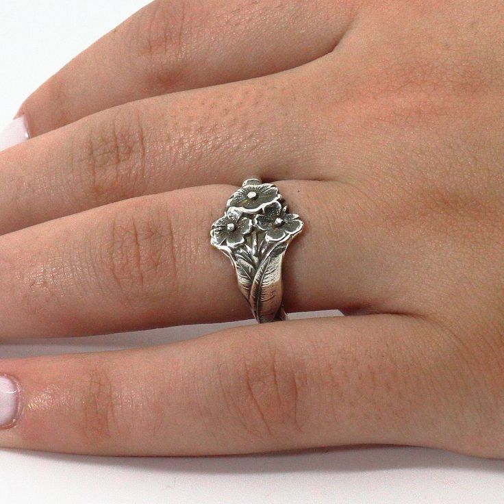 Forget Me Not Ring, Sterling Silver, Spoon Ring, Spoon ware Jewelry, Vintage Ring, Handmade Jewelry, Flower Ring, Gift For Mom, Gift For Girlfriend See more of our spoon rings here: https://www.etsy.com/shop/HoverHandmadeJewelry?ref=seller-platform-mcnav&section_id=48154802 See the rest of our store here: https://www.etsy.com/shop/HoverHandmadeJewelry Material: Crafted from genuine sterling silver for lasting beauty. Weight: 4gr Design: Features delicate forget-me-not flower motif. Spoon Ring: V Adjustable Flower Rings For Anniversary, Adjustable Flower Shaped Anniversary Rings, Vintage Flower Toe Ring As Gift, Vintage Flower Toe Ring For Gift, Vintage Flower Toe Ring Gift, Handmade Flower-shaped Ring, Vintage Flower Toe Ring, Vintage Flower Shaped Rings For Gift, Vintage Flower Shaped Ring As Gift