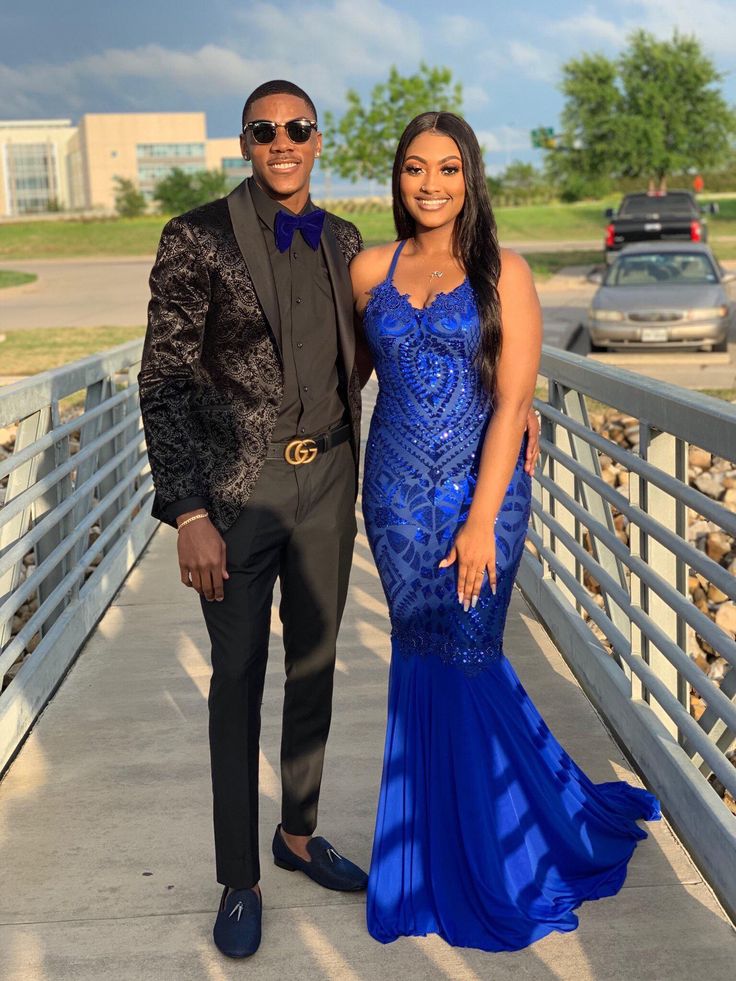 Hoco Suits For Guys Blue, Navy Blue And Gold Prom Couple, Prom Couples Outfits Blue, Royal Blue Prom Tuxedo Ideas, Dark Blue Prom Couple Outfits, Royal Blue Prom Outfits For Couples, Black And Blue Prom Suit, Blue Prom Outfits For Couples, Dark Blue Prom Dress Couple