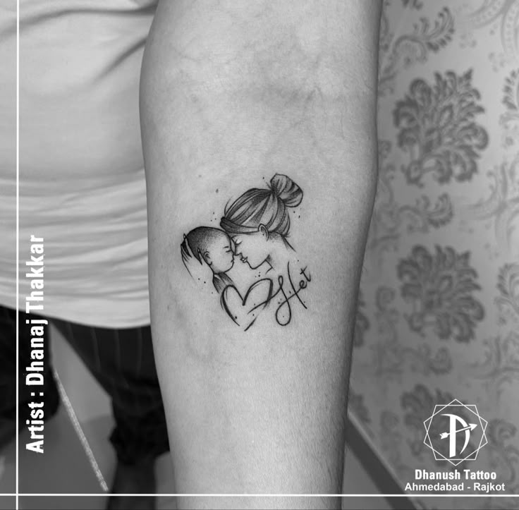 a woman's arm with a tattoo on it that reads, love and hugs