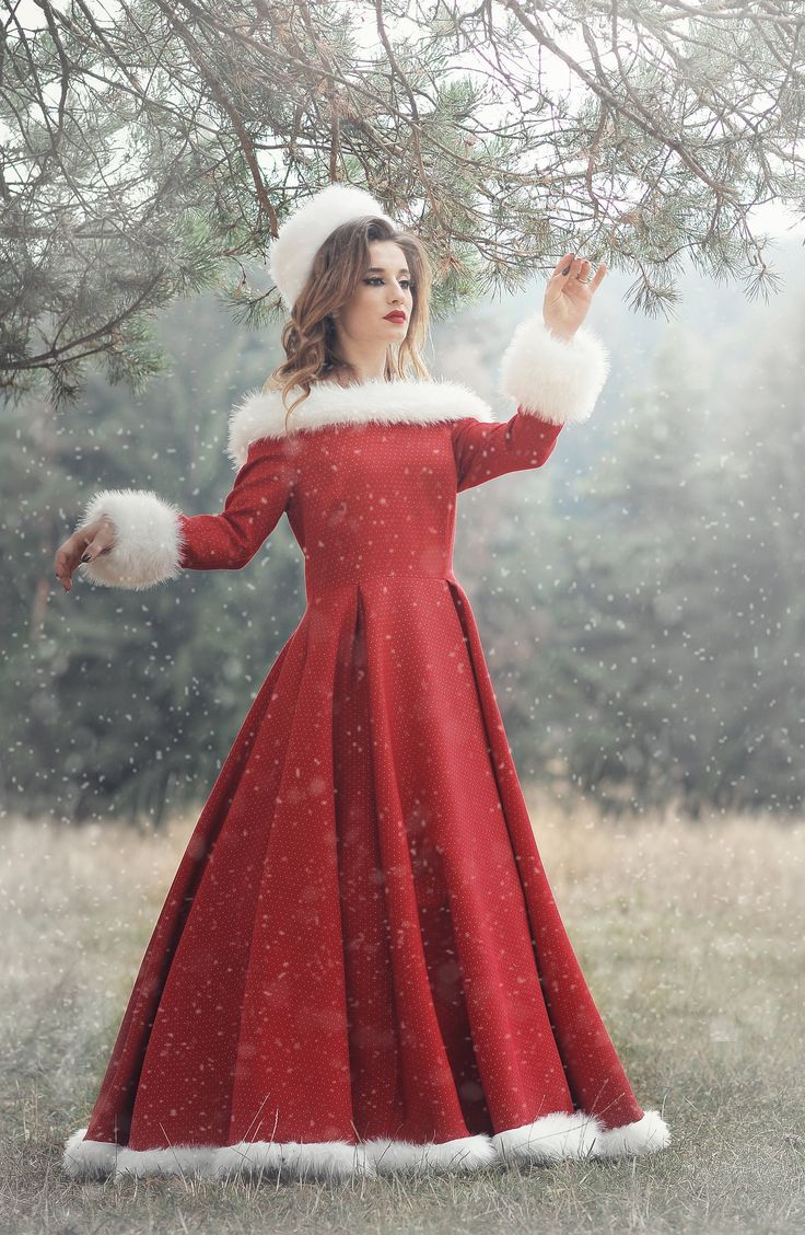 This Mrs Claus dress is made of brocarde fabric with small silver dots. The neckline and trim lines are outlined by white fake fur. The dress comes with an under skirt petticoat with crinoline The dress closes in the back with a zipper. This outfit will make you an outstanding, looking Lady Claus. This is custom-made to clients measurements and I require 2 weeks to finish it. Please contact me for further assistance to discuss measurements and how to purchase a made to order outfit. I will be ha Christmas Evening Dresses, Traditional Christmas Outfits, Christmas Dress Adult, Vintage Christmas Dress Women, Christmas Fashion Outfits 2023, Mrs Clause Costume For Women, Christmas Dress White, Red Satin Christmas Dress, Santa Claus Outfit Woman