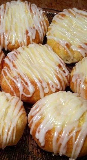 glazed donuts with icing on a cooling rack