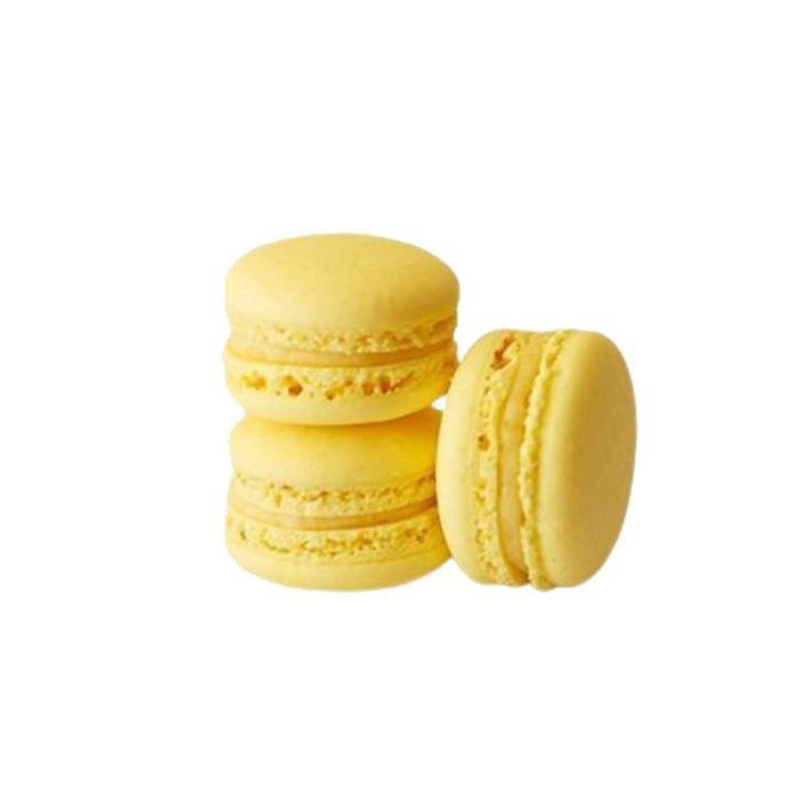 three yellow macaroons sitting next to each other