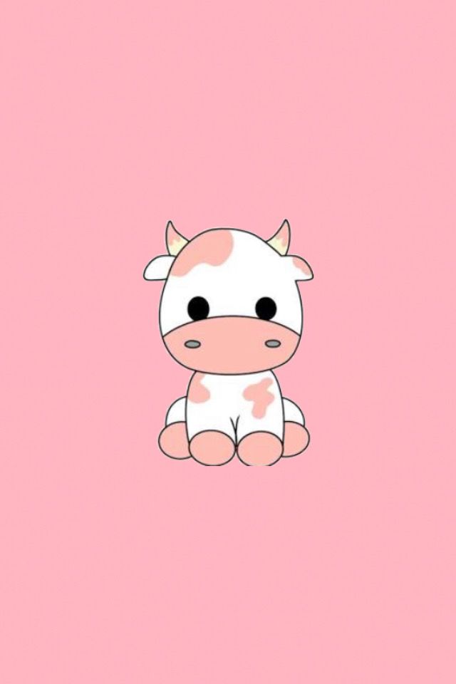 a cow sitting on top of a pink background