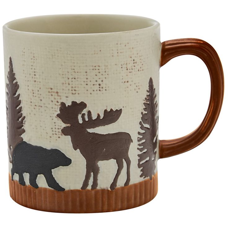 a coffee mug with moose and bear designs on it