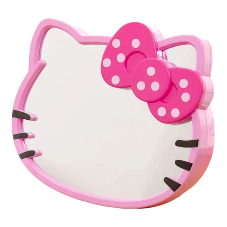 a pink hello kitty mirror with polka dots on it