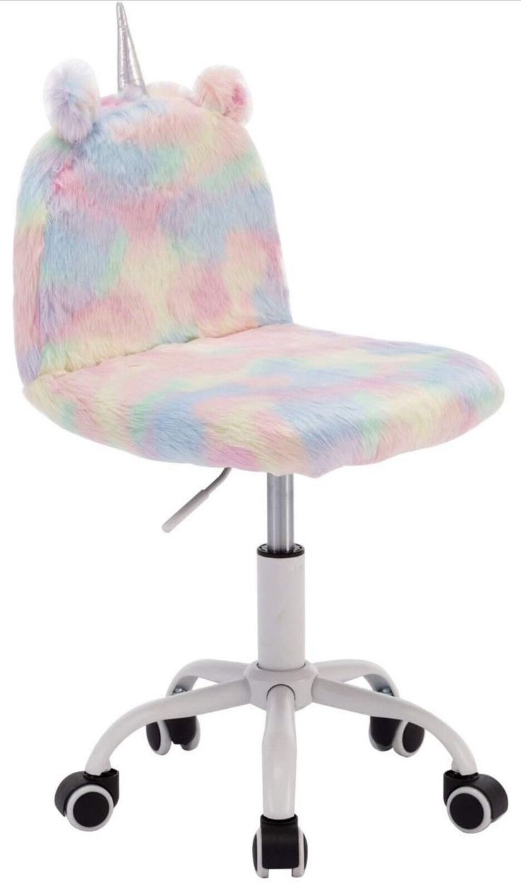 a colorful chair with a unicorn hat on it's back and an arm rest