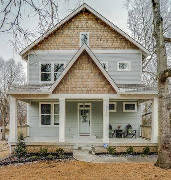 a house that is sitting in the grass