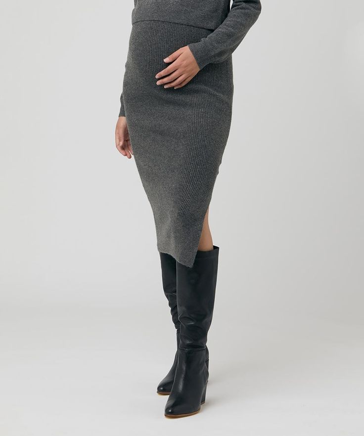 The Dani Knit Skirt is designed to sit high over your bump and fit perfectly through all stages of pregnancy. Have some fun styling this soft ribbed knit skirt with a cropped top or tied up tee, or wear as a set with our Sandy Detachable Nursing Knit. Slim fit Fully fashion knit Ribbed knit to allow for growth Side split Elastic waist 50% Acrylic, 40% Nylon, 5% Wool, 5% Elastane Length: 80cm (size small) Our model is 172cm tall, and has 81cm bust, 64cm under-bust and 95cm hips. She is wearing a Ribbed Knit Skirt, Stages Of Pregnancy, Maternity Brands, Nursing Wear, Pregnancy Wardrobe, Jumpsuit Outfit, Maternity Skirt, Pregnancy Stages, Knit Midi