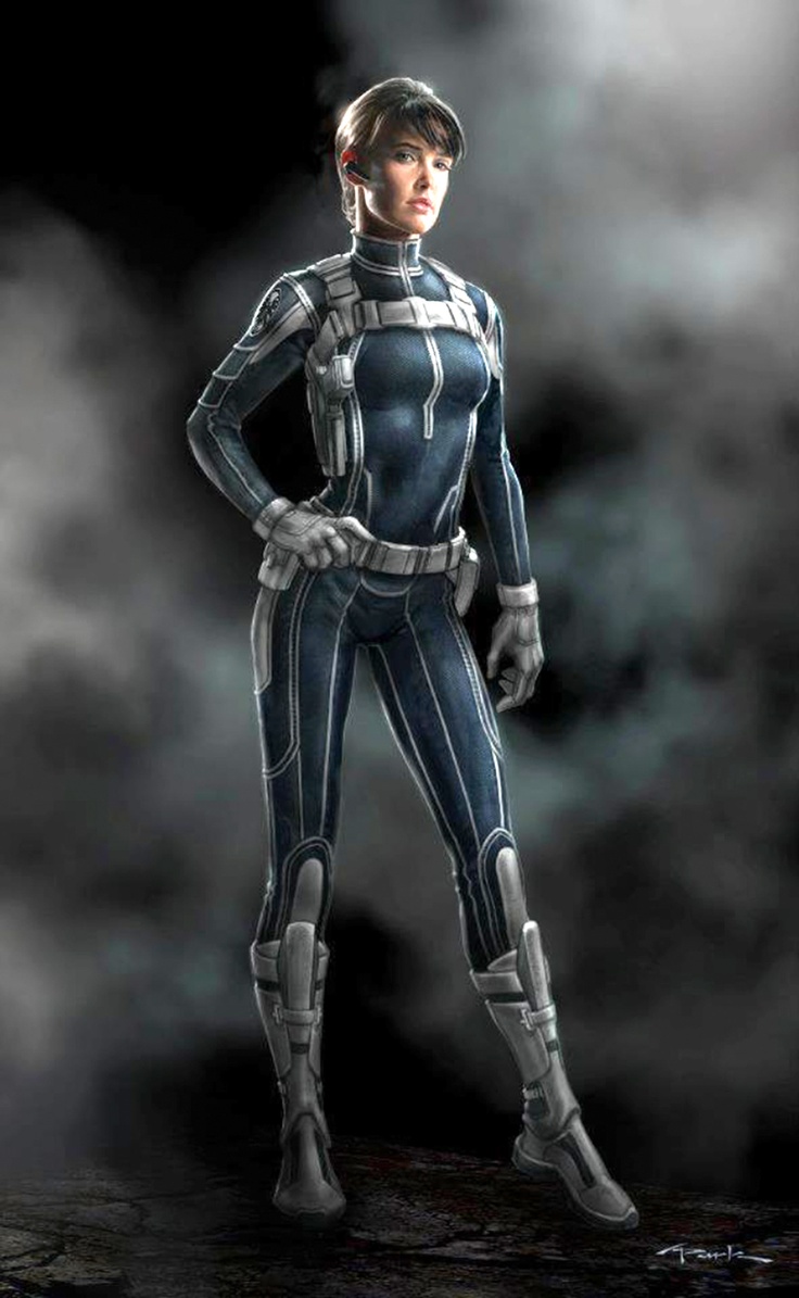 a woman in a futuristic suit standing with her hands on her hips