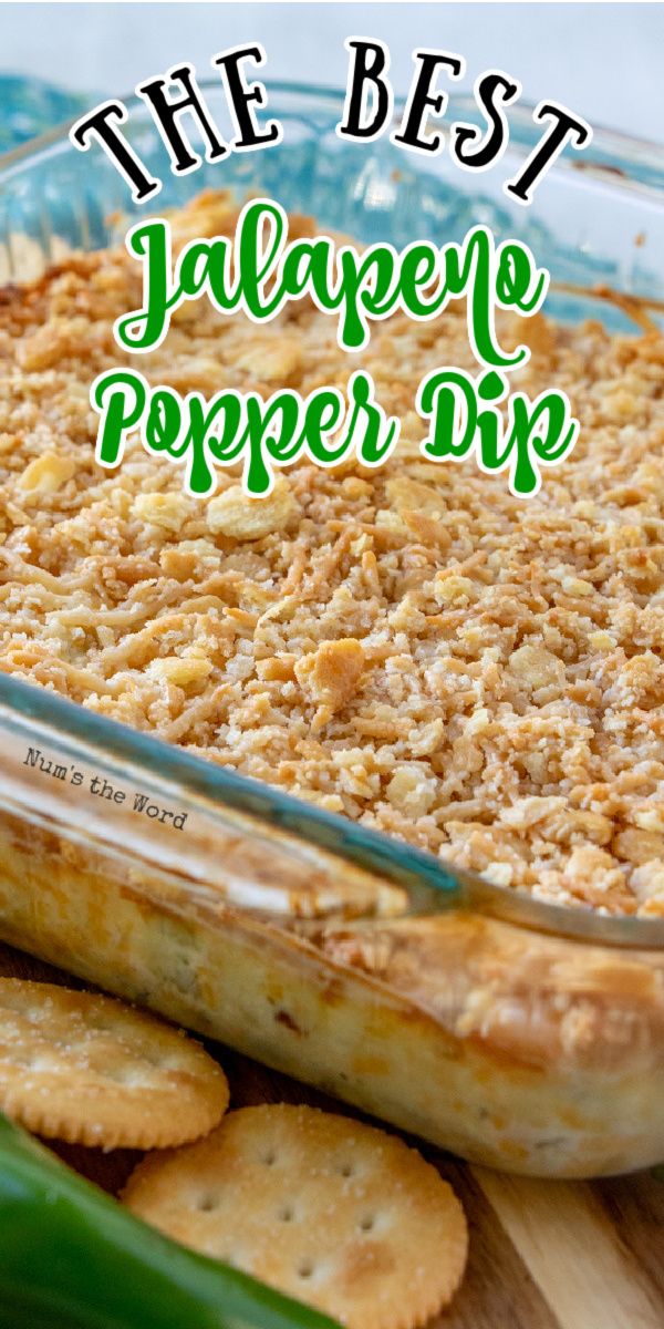 the best jalapeno popper dip in a casserole dish with crackers