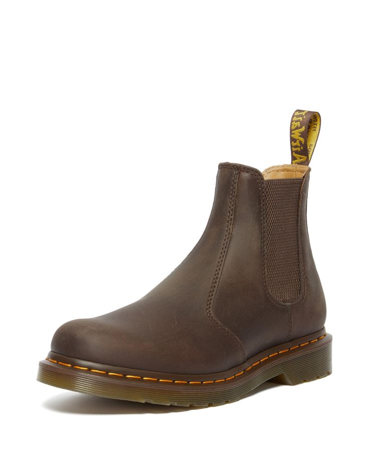 PRICES MAY VARY. Crazy Horse is heavyweight leather with a tough, worn-in appearance. Chelsea boot style Made with all the classic Docs DNA, including grooved sides, heel-loop and yellow welt stitching Built on the iconic Dr. Martens air-cushioned sole, which is oil and fat resistant, with good abrasion and slip resistance Elastic gussets Classic Ankle-high Steel Toe Work Boots, Rugged Chelsea Boots With Leather Footbed For Winter, Classic Brown Chelsea Boots With Reinforced Toe, Rugged Leather Chelsea Boots With Steel Toe, Casual Boots With Reinforced Stitching And Round Toe, Casual Distressed Brown Boots With Rubber Sole, Rugged Chelsea Boots With Reinforced Round Toe, Casual Chelsea Boots With Snip Toe And Leather Footbed, Classic Steel Toe Chelsea Boots