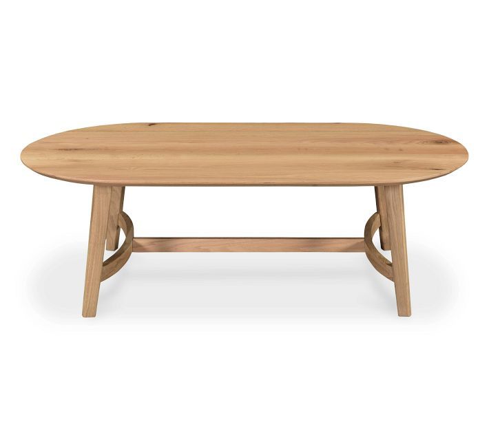 an oval wooden table with two legs and a circular wood top, on a white background