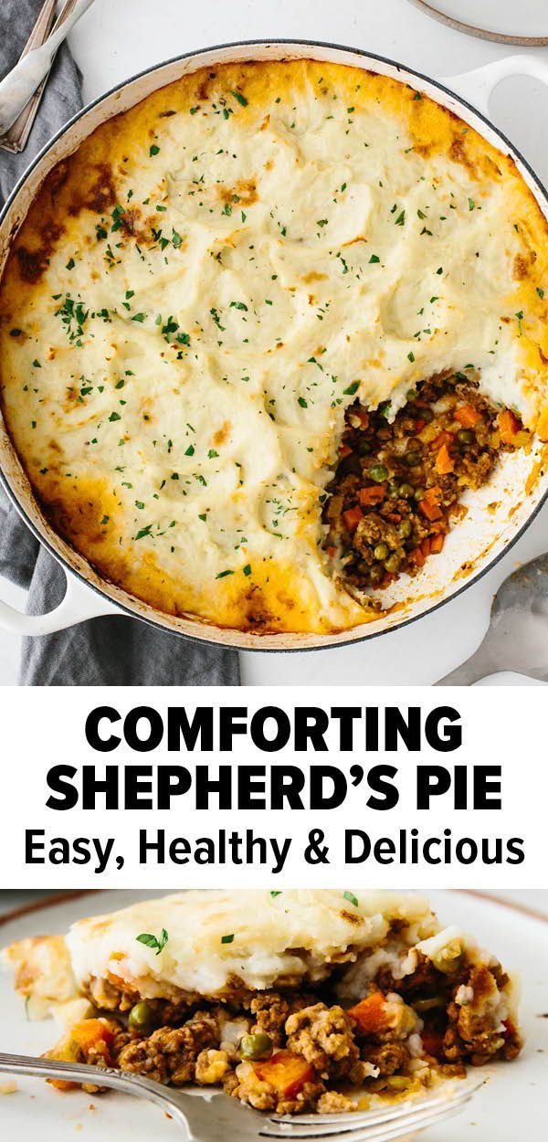 a casserole dish with meat and vegetables in it on a white plate next to a fork