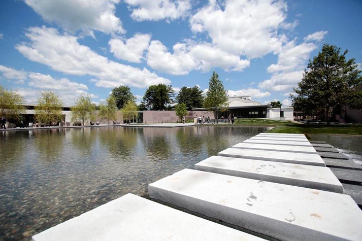 the water is calm and clear for everyone to see in the park or on the other side