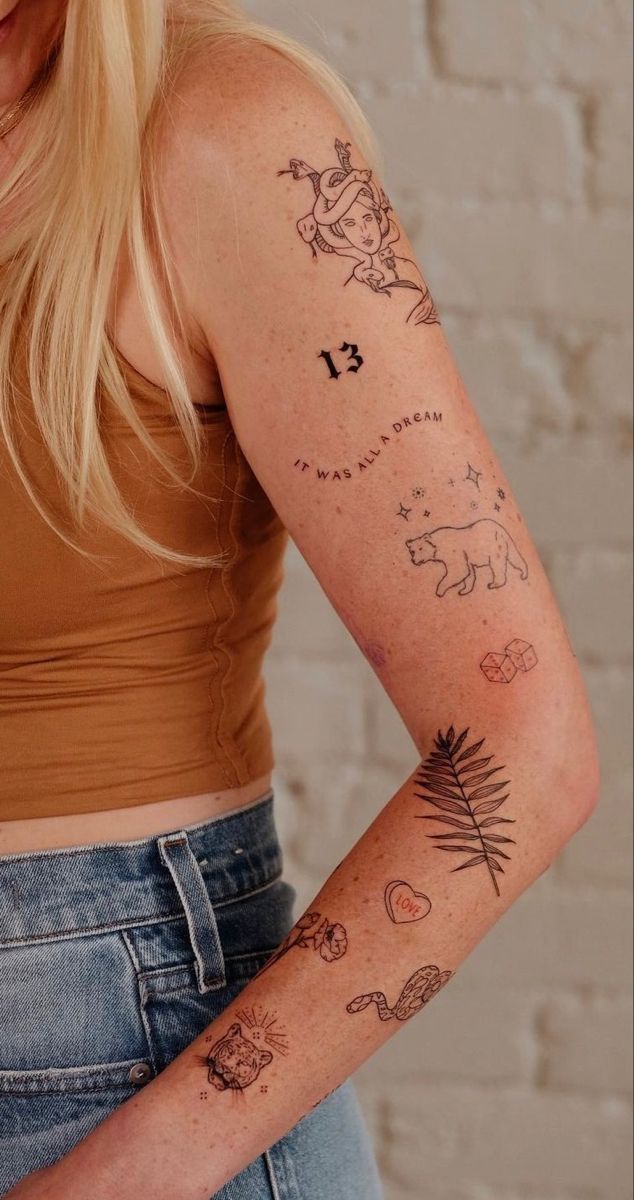 a woman with a tattoo on her arm