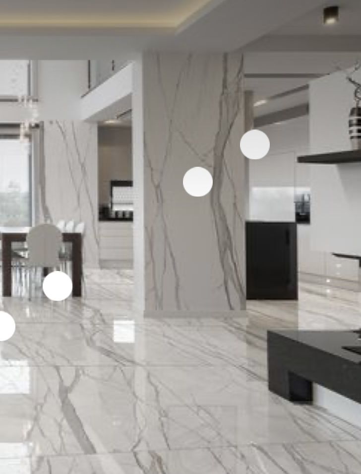 the interior of a modern house with marble flooring