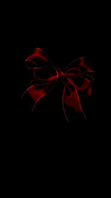 a red bow on a black background