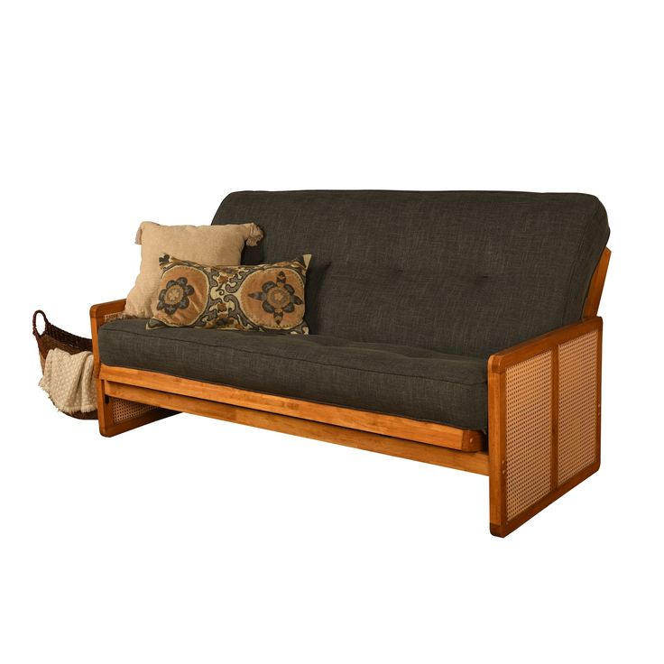 a wooden futon with two pillows on it's back and the top half open