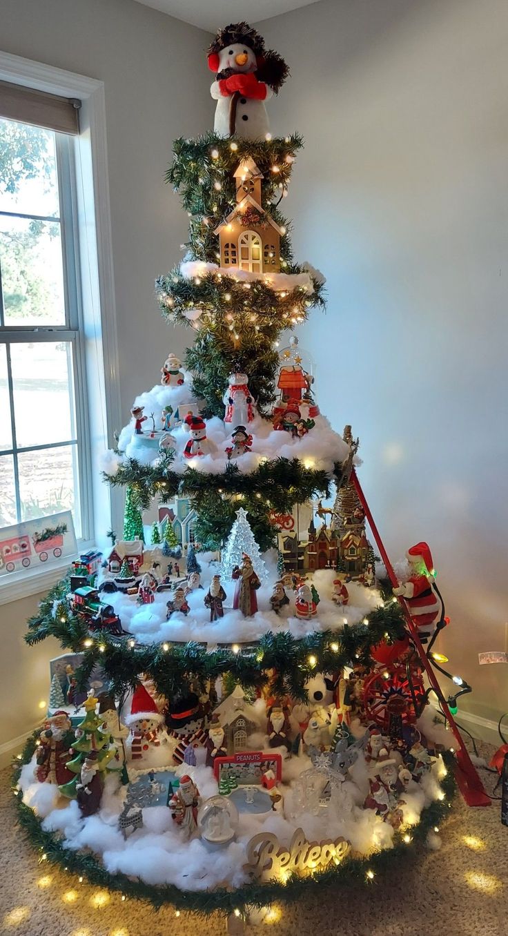 a christmas tree decorated with lights and ornaments