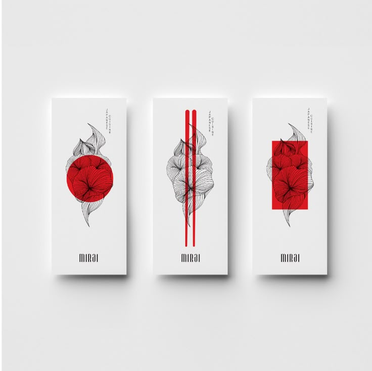 three cards with red and white designs on them