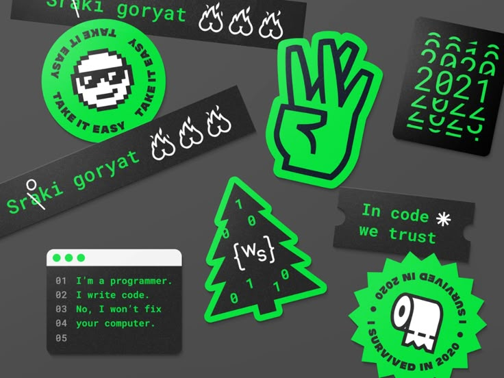 some stickers that are on the back of a computer keyboard and it's green