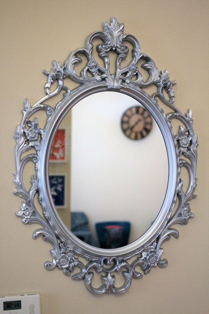 a mirror that is hanging on the wall