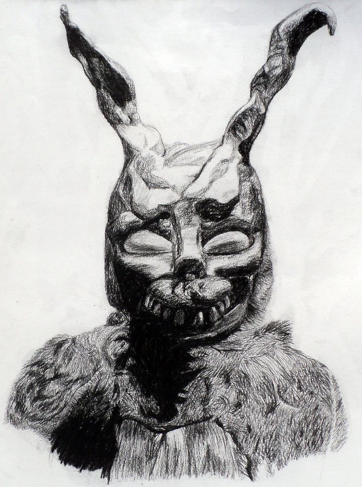 a black and white drawing of a rabbit mask