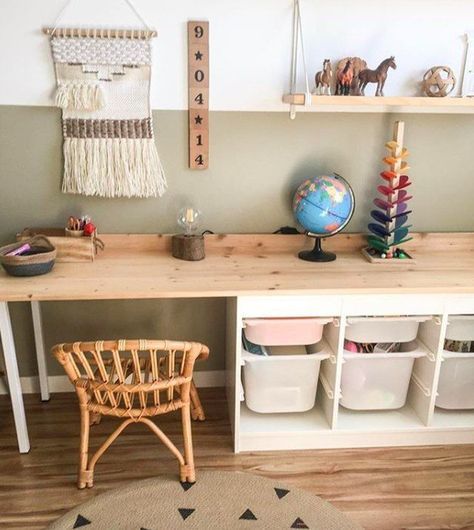 a child's playroom with toys and bookshelves