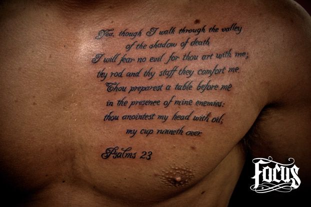 the back of a man's chest with a poem written on it