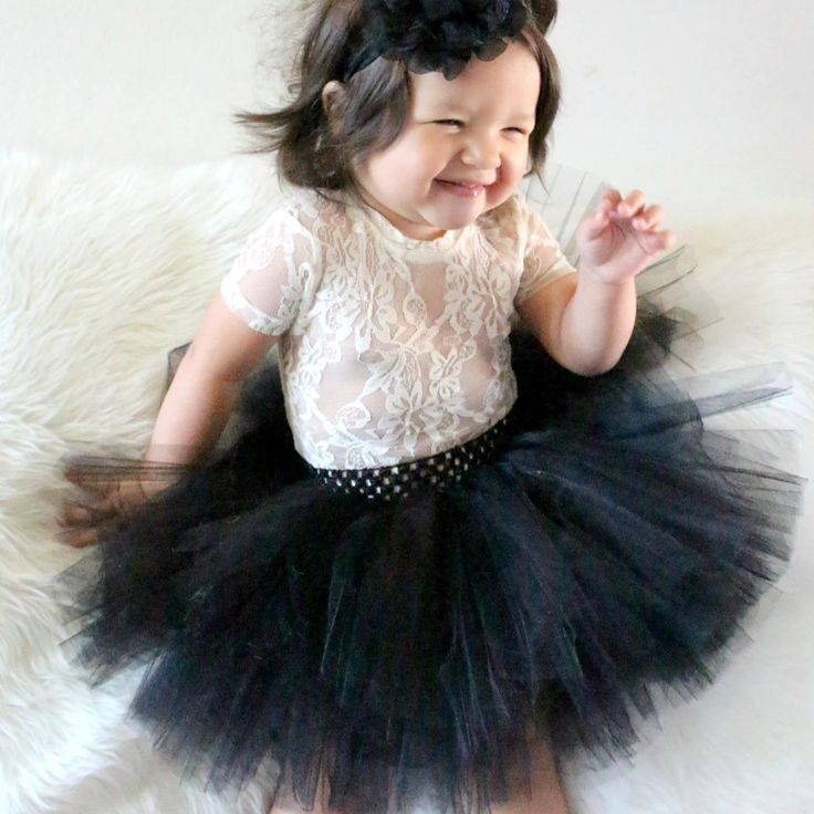 Make sure she looks sweet and playful for a family photo shoot in this black tutu set from Beautiful Bows Boutique. Customized just for her, it features a fluffy black tulle tutu complete with stretch waistband for ease of dressing. You can also choose a matching black flower headband or infant stretch headband for a cohesive look that positively shows off her personality. Your pint-sized diva is sure to shine whether at a family photo shoot or even a pageant! This is an original Beautiful Bows Baby Hair Bows Headbands, Handmade Baby Headbands, Black Tutu Skirt, Handmade Tutu, Big Hair Bows, Black Tutu, Family Photo Shoot, Princess Tutu, Bow Headband Hairstyles