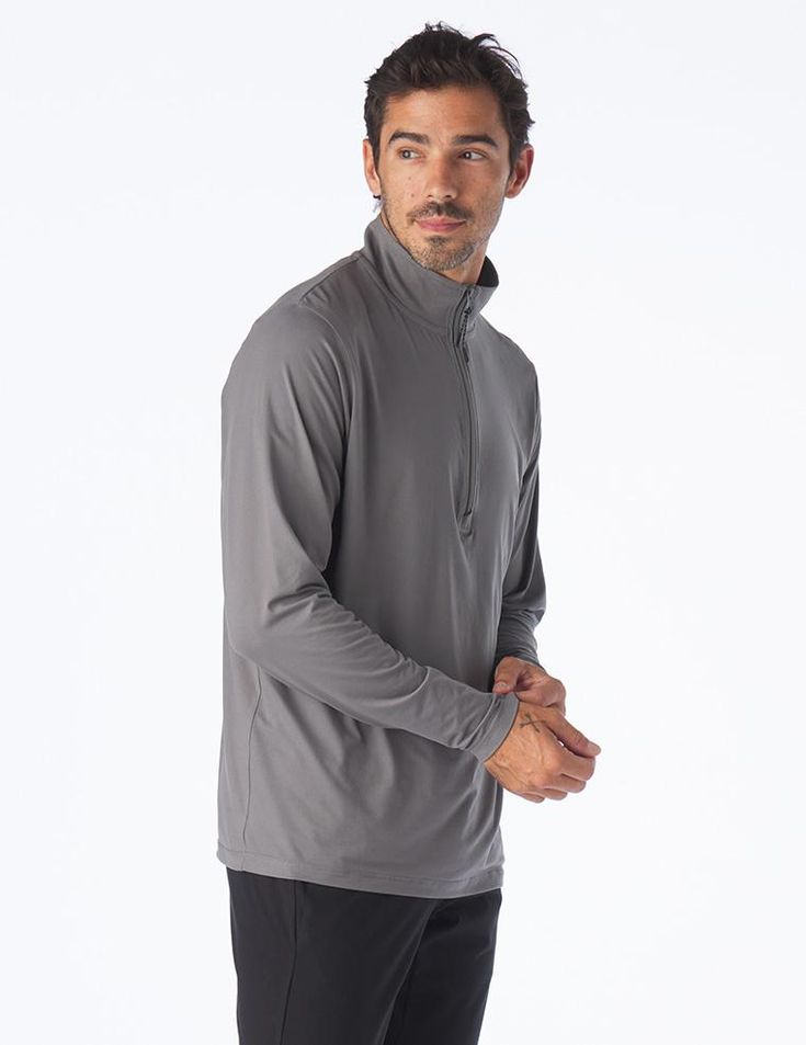 Can a top be cozy and sleek? Meet the Tahoe Quarter Zip. With this top, you’ll never have to sacrifice warmth for style. Superior stretch and quick drying technology make it an obvious choice as your #1 warm but not too warm layer. Sporty Half-zip Tops For Layering, Long Sleeve Moisture-wicking Activewear, Long Sleeve Moisture-wicking Activewear For Layering, Winter Half-zip Loungewear Tops, Winter Loungewear Half-zip Tops, Winter Loungewear Tops With Half-zip, Four-way Stretch Top With Thumbholes, Sporty Half-zip Winter Top, Fall Layering Half-zip Tops