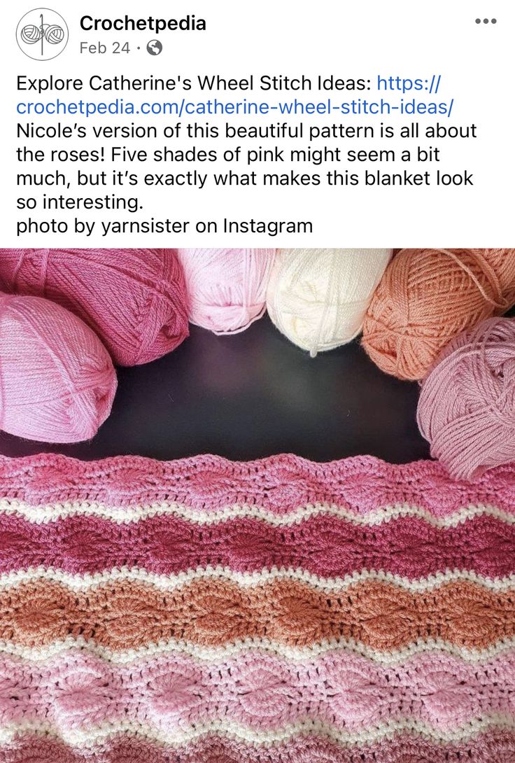 the crocheted blanket is next to balls of yarn