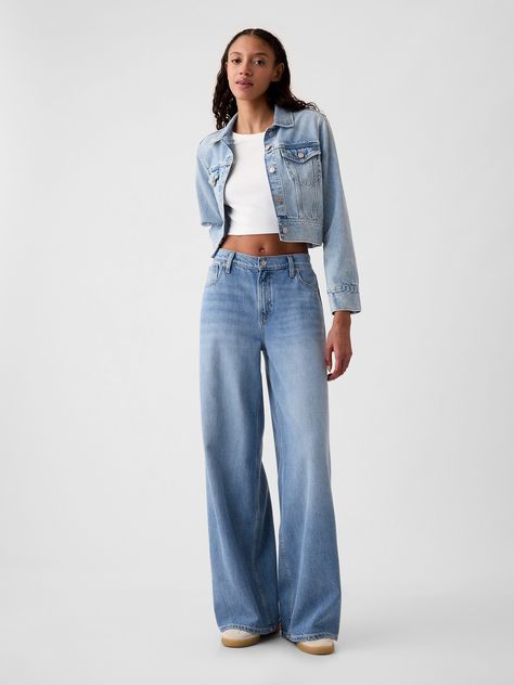 Fit:  A full-length, supersoft baggy jean that's fitted on the waist & relaxed all the way down.  ​ Fabric:  55% Cotton, 40% Tencel, 5% Recycled Cotton.  Stretch: No Stretch Jeans.  Authentic denim that gets better with every wear.  Made to wear all day & break in over time.  ​ Rise :  Mid Rise Jeans.  Look: A five-pocket baggy jean in a light or medium indigo wash.  ​ Details:  Zip fly & five-pocket styling.  Responsibly Made: This pair of denim is part of our water-saving Washwell program.  Compared with conventional wash methods, Washwell uses at least 20% less water and has saved over a billion liters of water since 2016.  Our Mid Rise Jean has a 10" 25 cm) rise. ​ Fitted at the waist and hip.  Loose, baggy through the leg.  Full-length jean.  Hits below the ankle. ​ 26" 66 cm) leg ope Style Wide Leg Jeans, Baggy Jean, Jeans Look, Bdg Jeans, Winter Jeans, Wide Jeans, Break In, Women Denim Jeans, Mid Rise Jeans