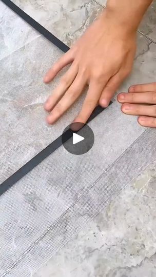 someone is using a knife to cut through the floor