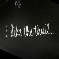 the words i like the thrill written in white ink