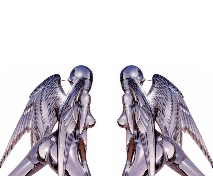 two silver angel wings on top of each other